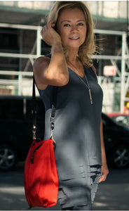 Why Every Working Woman Needs a Water Resistant Crossbody Bag with a Shoe Compartment